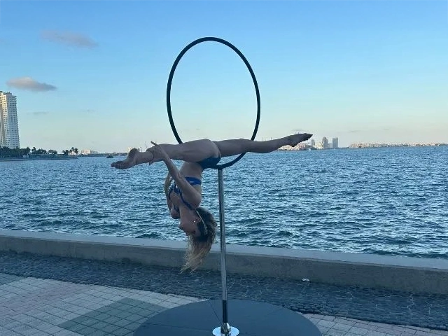 Standing lyra performance in front of bay, StepFlix Entertainment, Miami, Florida.