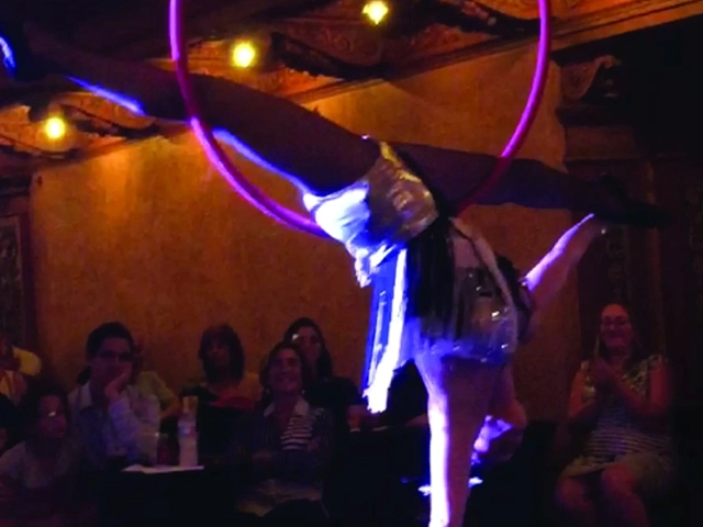 Standing lyra leg split performance, StepFlix Entertainment, Miami, Florida.