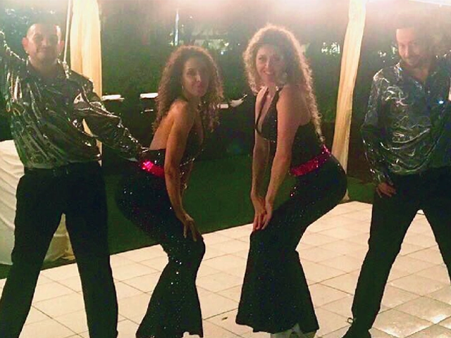 Disco dancers, show, StepFlix Entertainment, Miami, FL.