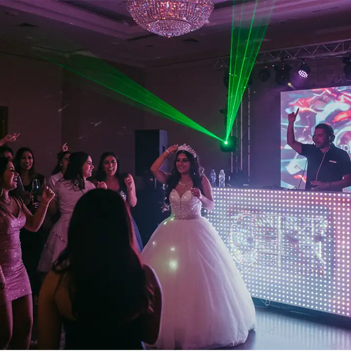 Quinceañera dancing with DJ and guests at Miami party, StepFlix Entertainment, FL.